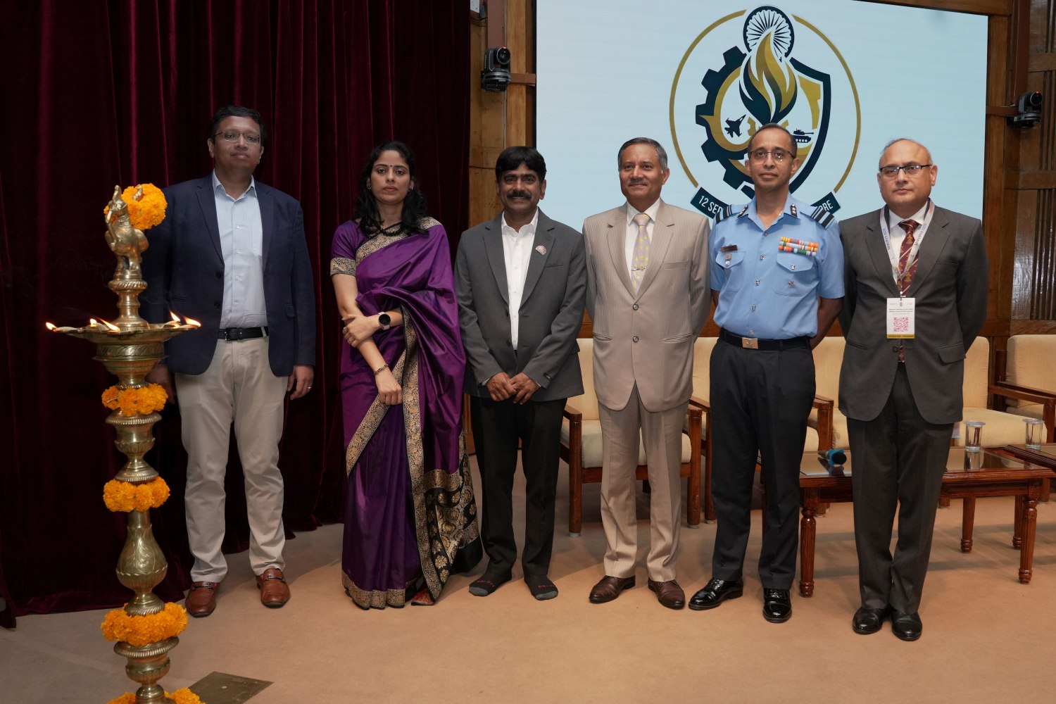 (L-R) Mr. Kamesh Raghavendra, Kshipra Foundation; Wing Cdr Shweta Raghav; Prof. U Dinesh Kumar, Director-in-charge, IIM Bangalore; Air Marshal Awadhesh Kumar Bharti, SYSM, AVSM, VM (Retd.), former Deputy Chief of the Air Staff; Air Vice Marshal Ashutosh Shrivastava, VSM, ACAS (Maintenance Planning); and Brig Vikas Sharma, inaugurate Shaurya 2026, a national seminar on the Indian Military-Industrial Complex, conceived and organized by Batch 5 of the Business Management Programme for Defence Officers, an Executive Education Programme at IIMB.